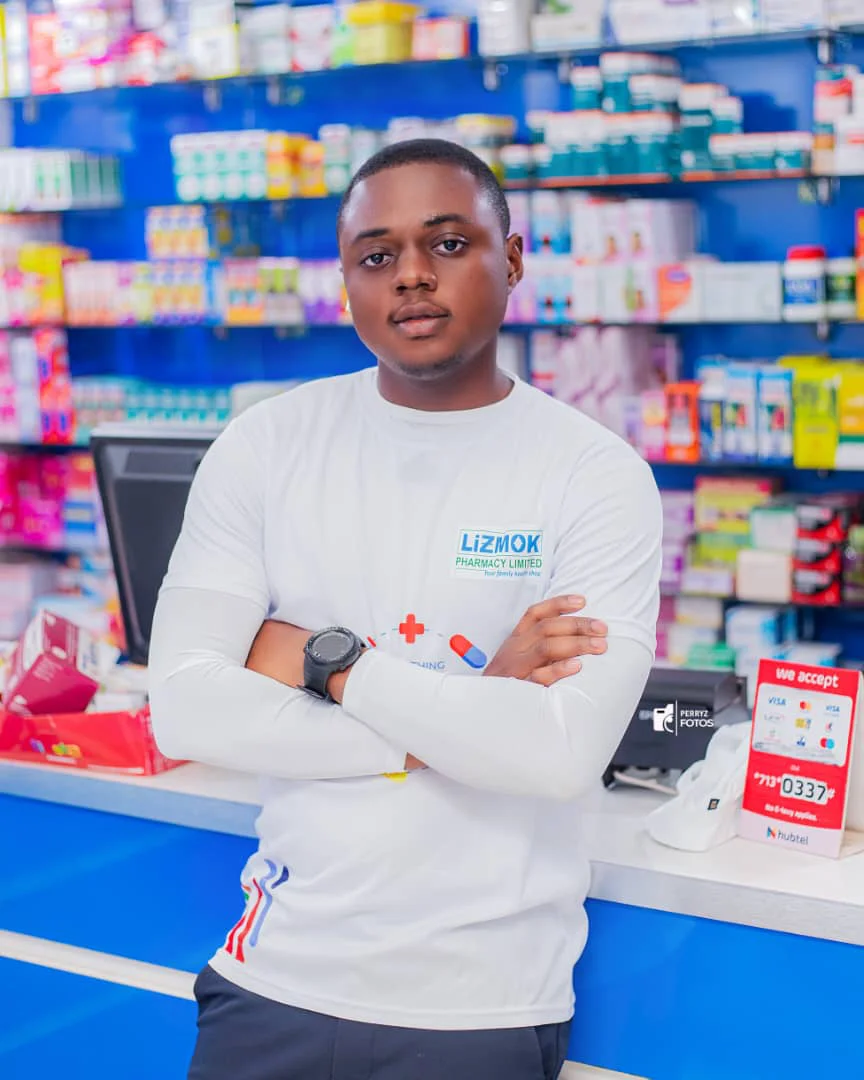 Lizmok Pharmacy team member in store